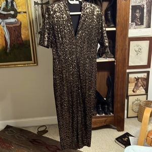 Worn once! Perfect fall holiday fun look! Little shoulder pads deep v neck